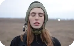 a woman closing her eyes