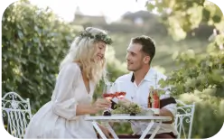 a couple in the garden drinking coffee